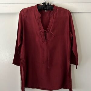 Burgundy silk top with front tie neckline side slits